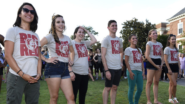 Interns standing with shirts that honor faculty member Gerri Houlihan