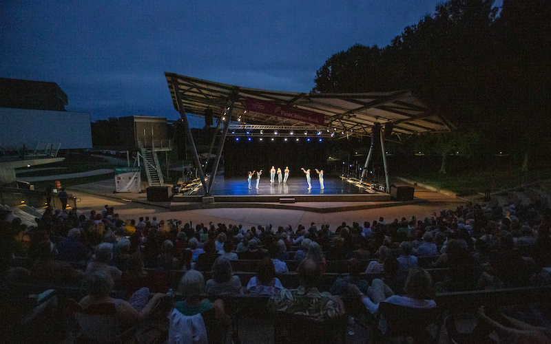 A large outdoor amphitheater at night