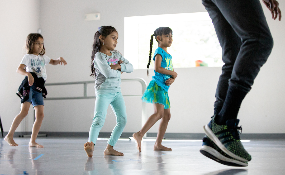 Kids participating in a dance class