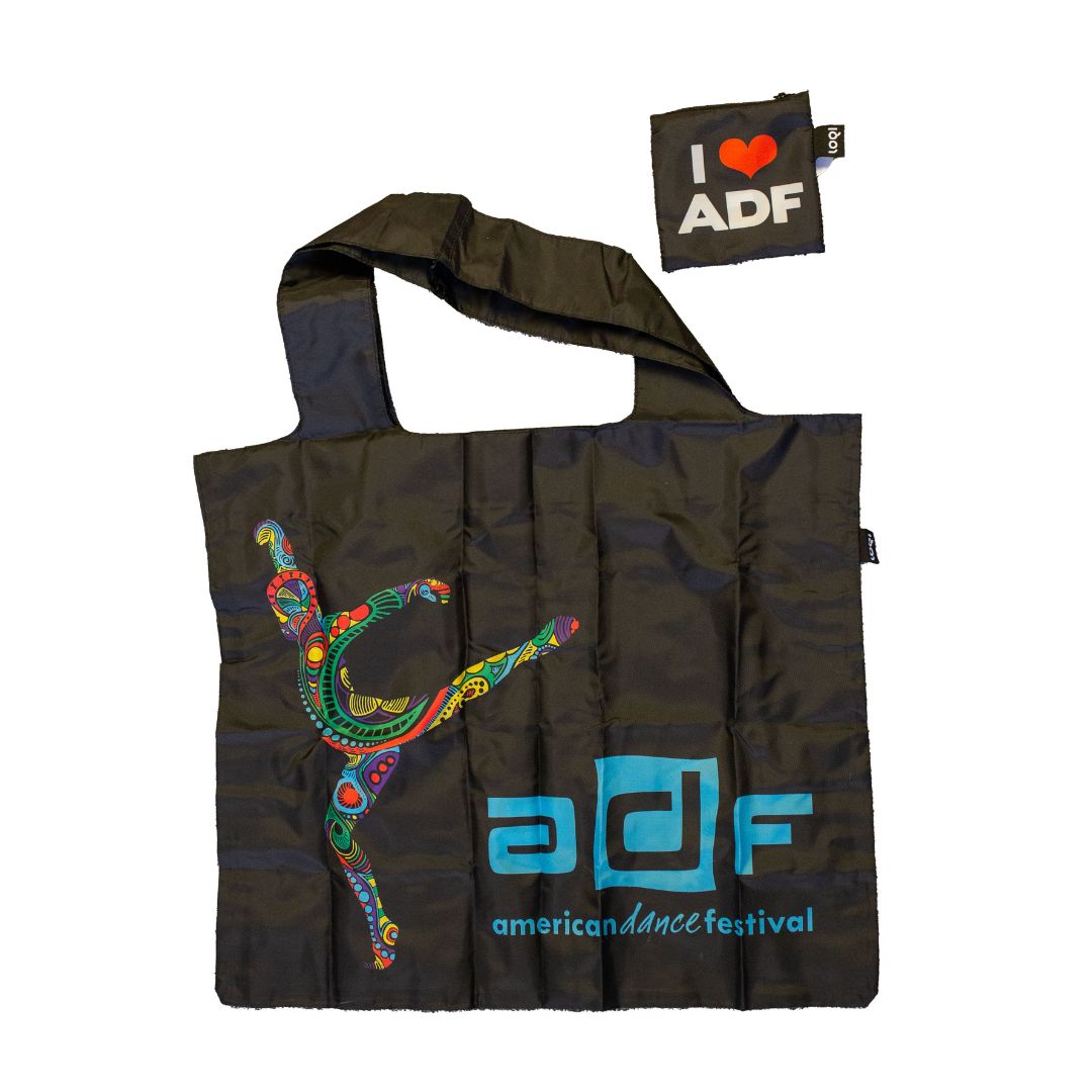 A grey tote bag with the ADF logo printed on it